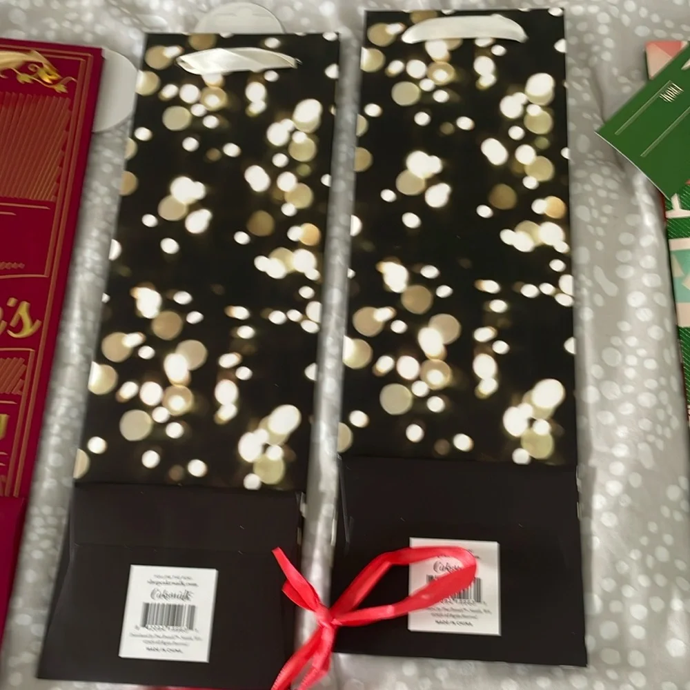 Set of 10 miscellaneous wine gift bags. Great for the upcoming holidays